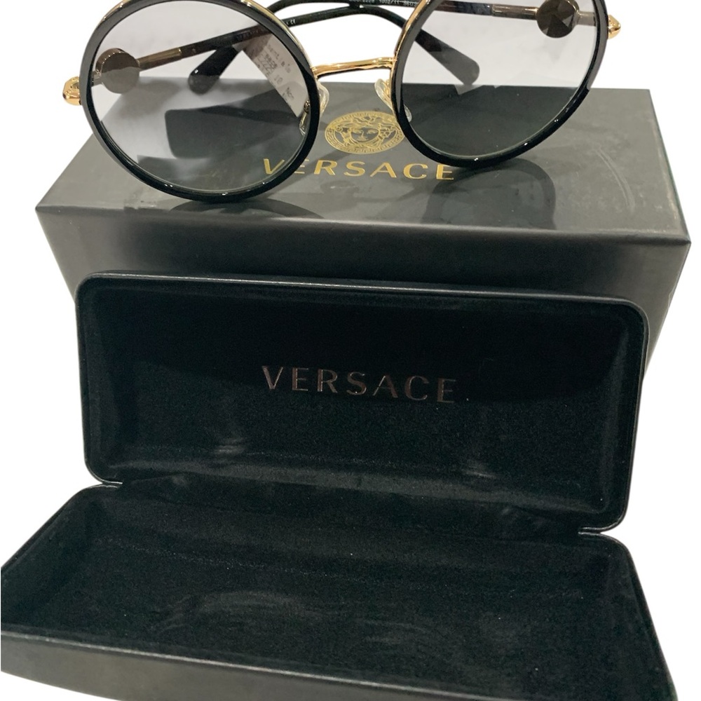 Versace Women's Sunglasses in Black with Gold Details